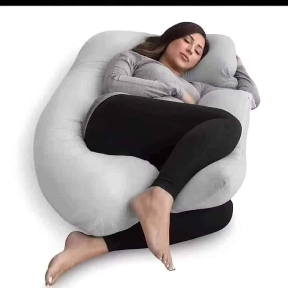 C shaped pregnancy pillow Pregnancy pillows ▫ C shape ▪ Made of ; ▫ Microfiber ▫ Satin inner cover ▫ Removable outer cotton cover. ◾ Size; standard