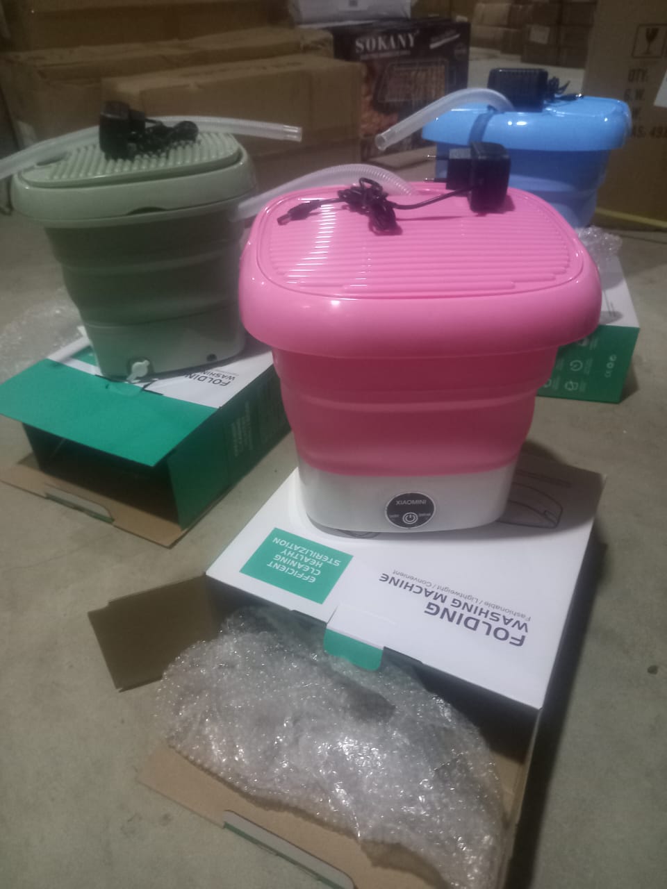 mini washing machine Washing Machine Small Household Folding Portable Automatic This is a small foldable portable washing machine, its small size is very suitable for washing children\'s clothes, unde