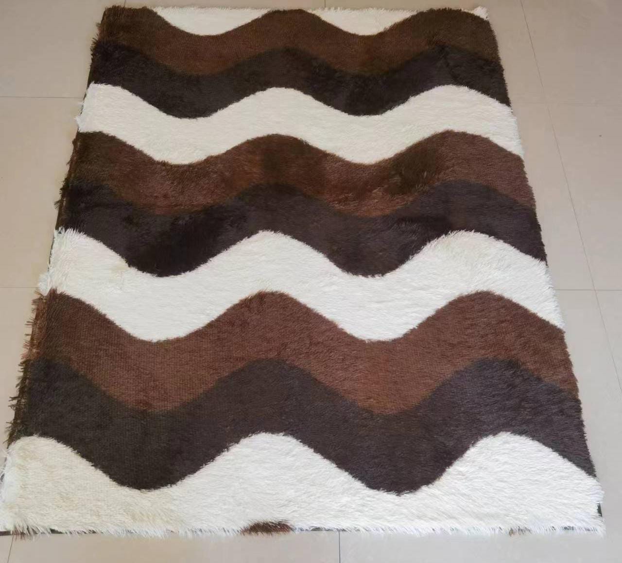 Pattern fluffy carpetThis woolen shag rug in cotton material and a thick surface is the ideal carpet for your home that will give you value for your money. It is very soft for a warm and cozy living s