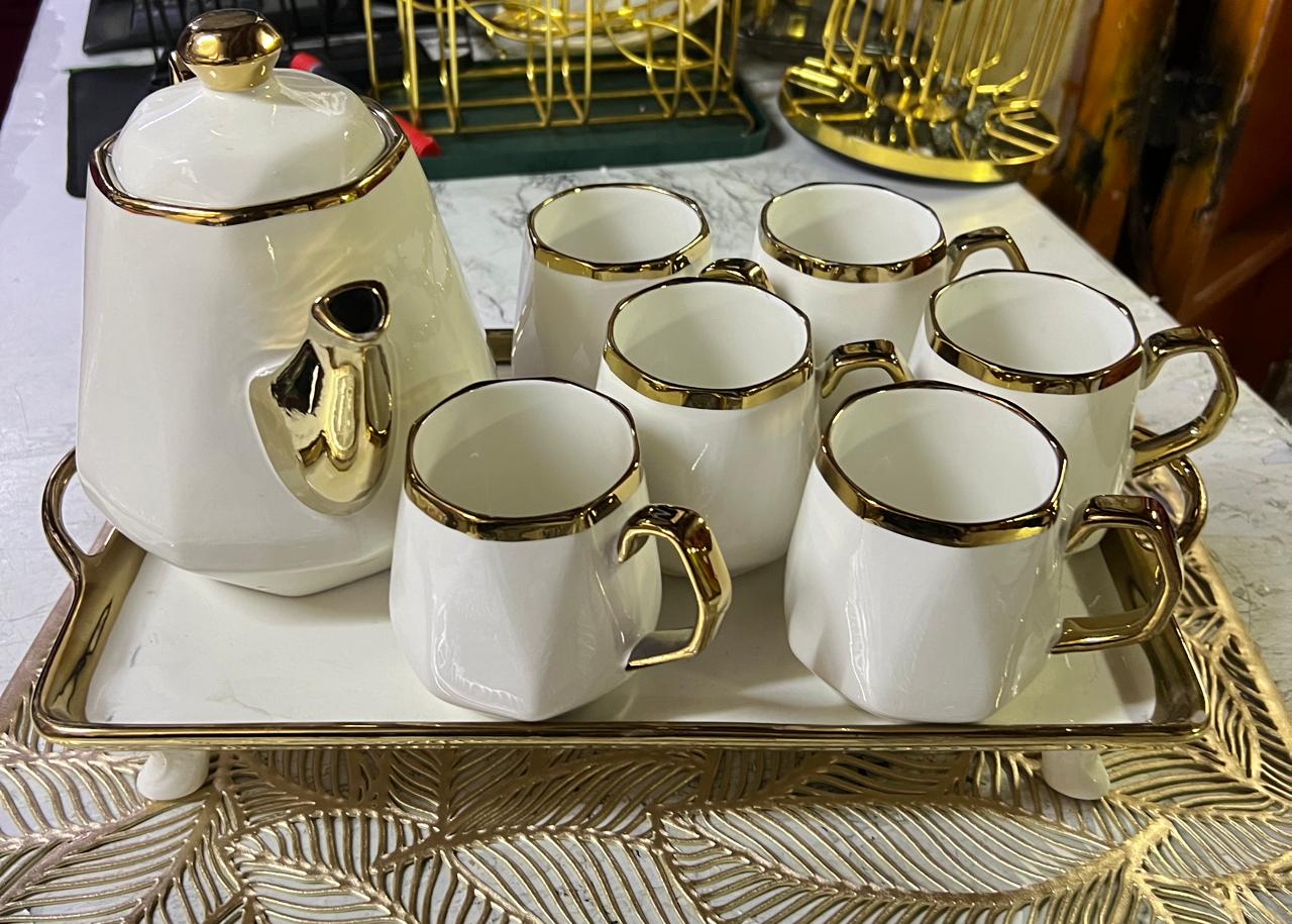 Ceramic tea set jur 1.2 ltrs 6 pcs mugs 230 ml and tray 1 Tray that helps you carry and display your tea set descently before your guests.