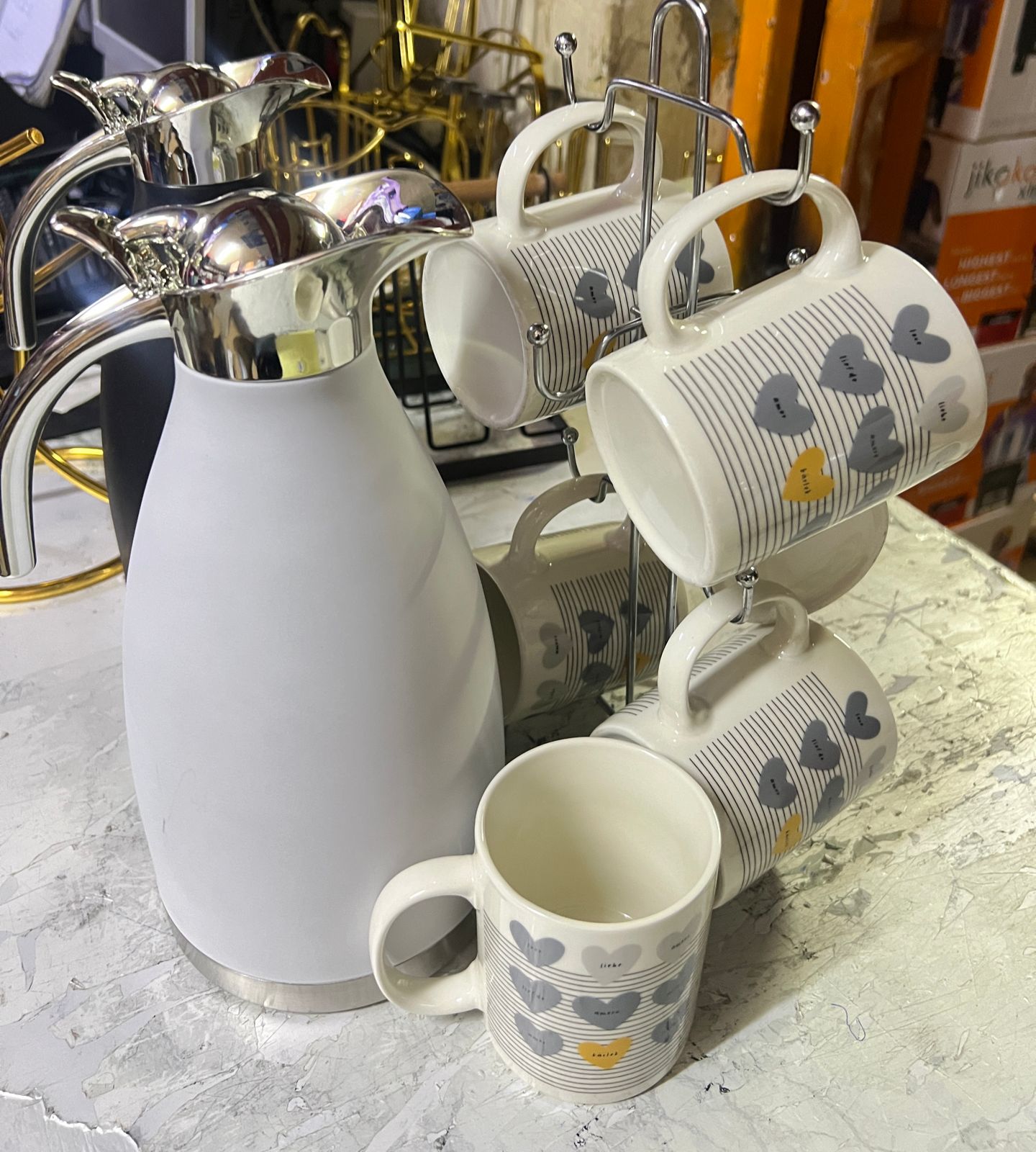 Tea set 6 pc classy and elegant cups that enables you serve a good number of guests.
1 Tea mug that can contain both hot and cold. 
Tea mug can hold a good volume of your drink to serve the guests.