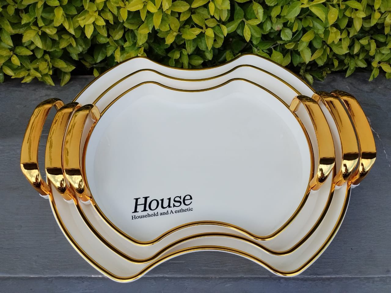 Set of 3 Golden Trays . High quality & different sizes sliver rectangular decorative serving tray set with designer golden color handle. Ideal for personal use, or gifting purposes on special occasion