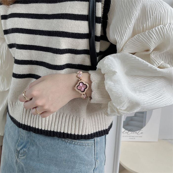 2024 new high-grade watch, small and delicate four leaf clover petal wrist watch bracelet, simple and fashionable quartz women's watch, popular in Africa, Tiktok - same style