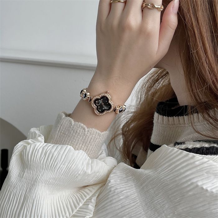 2024 new high-grade watch, small and delicate four leaf clover petal wrist watch bracelet, simple and fashionable quartz women's watch, popular in Africa, Tiktok - same style