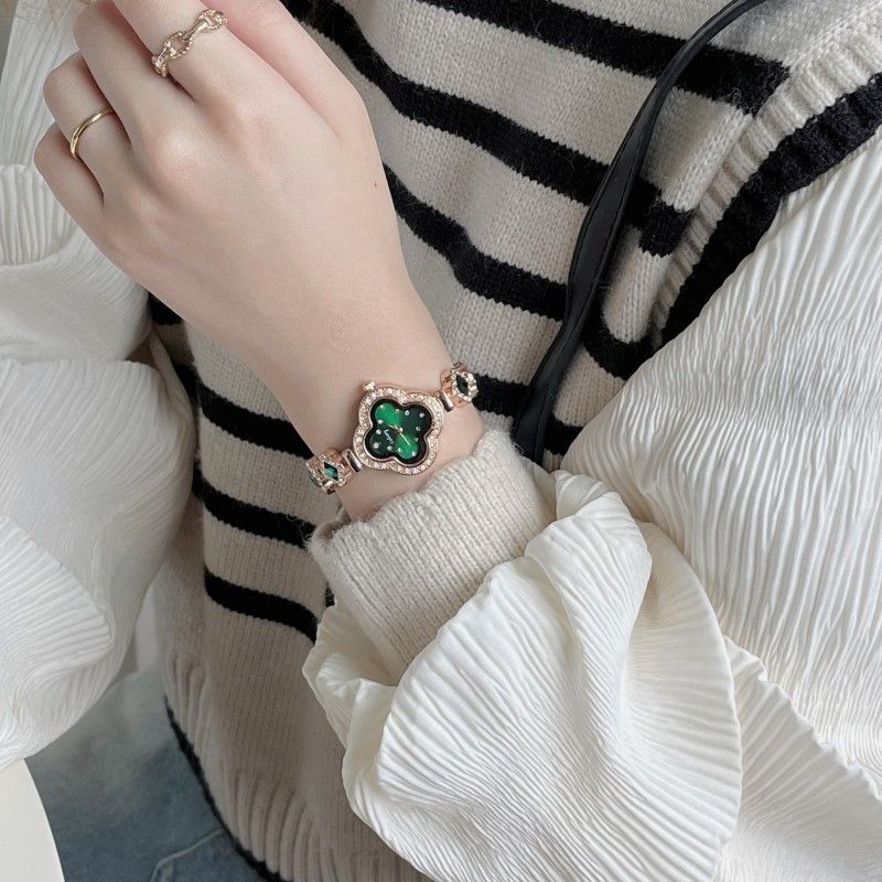 2024 new high-grade watch, small and delicate four leaf clover petal wrist watch bracelet, simple and fashionable quartz women's watch, popular in Africa, Tiktok - same style