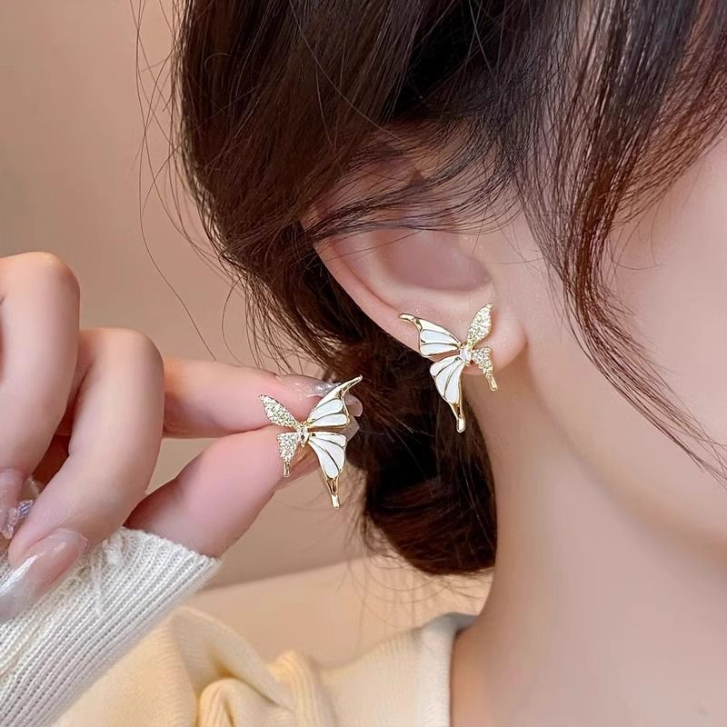 High end wheat ear long tassel earrings with two wearing silver needles, fashionable and personalized, light luxury design, revealing face, slim earrings for women