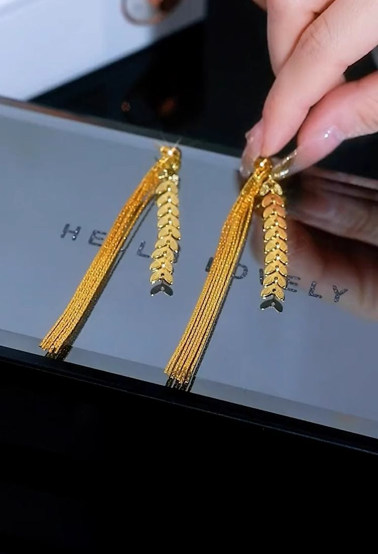 High end wheat ear long tassel earrings with two wearing silver needles, fashionable and personalized, light luxury design, revealing face, slim earrings for women