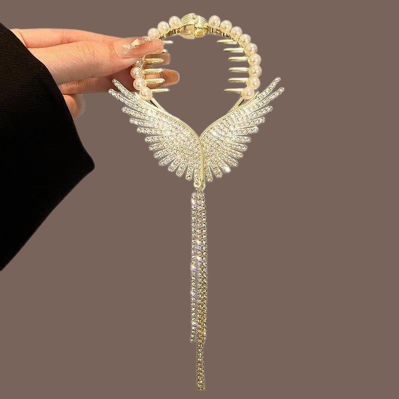 The new tassel pearl flower hair clip, with a curled hair clip at the back of the head for women, is a high-end and stylish ball shaped hair accessory that is versatile and stylish,Not easy to fall of