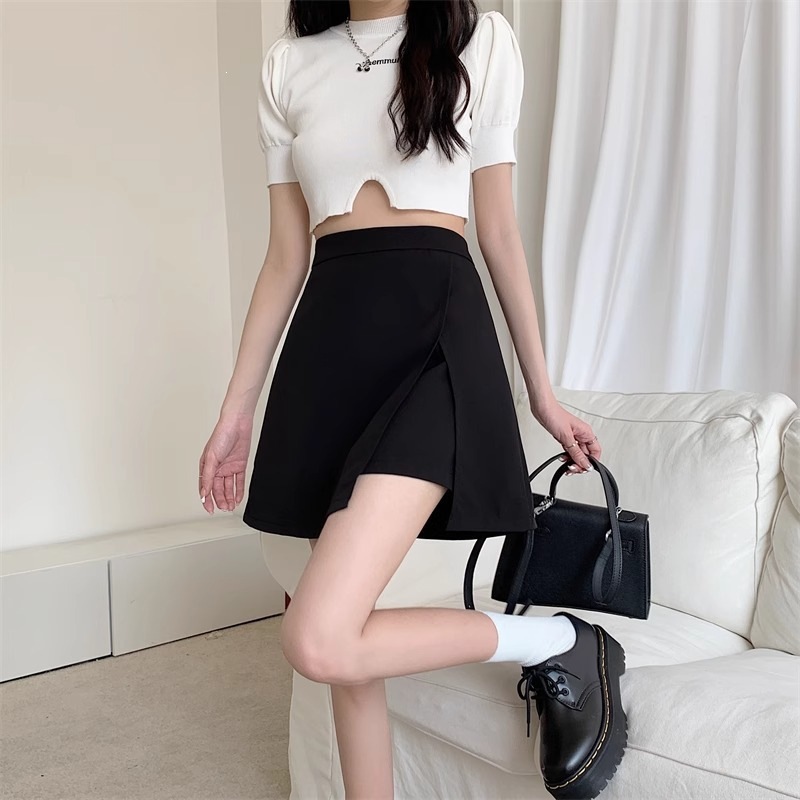 Irregular high waisted anti glare A-line hip skirt for women's clothing, Korean retro versatile, slimming, solid color slit skirt