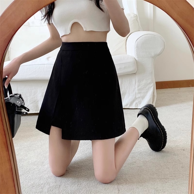 Irregular high waisted anti glare A-line hip skirt for women's clothing, Korean retro versatile, slimming, solid color slit skirt
