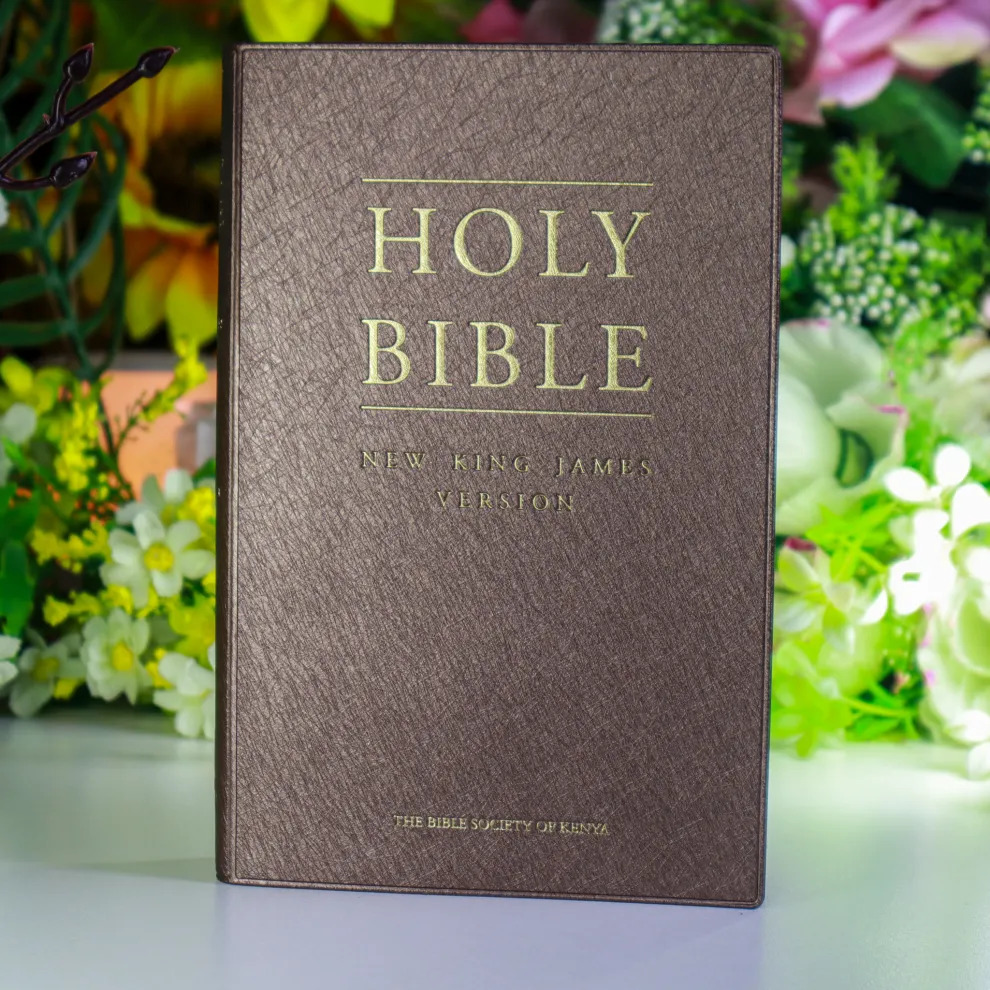 Elevate your spiritual journey with this stunning New King James Version (NKJV) Bible, wrapped in a rich and professional coffee brown vinyl cover.