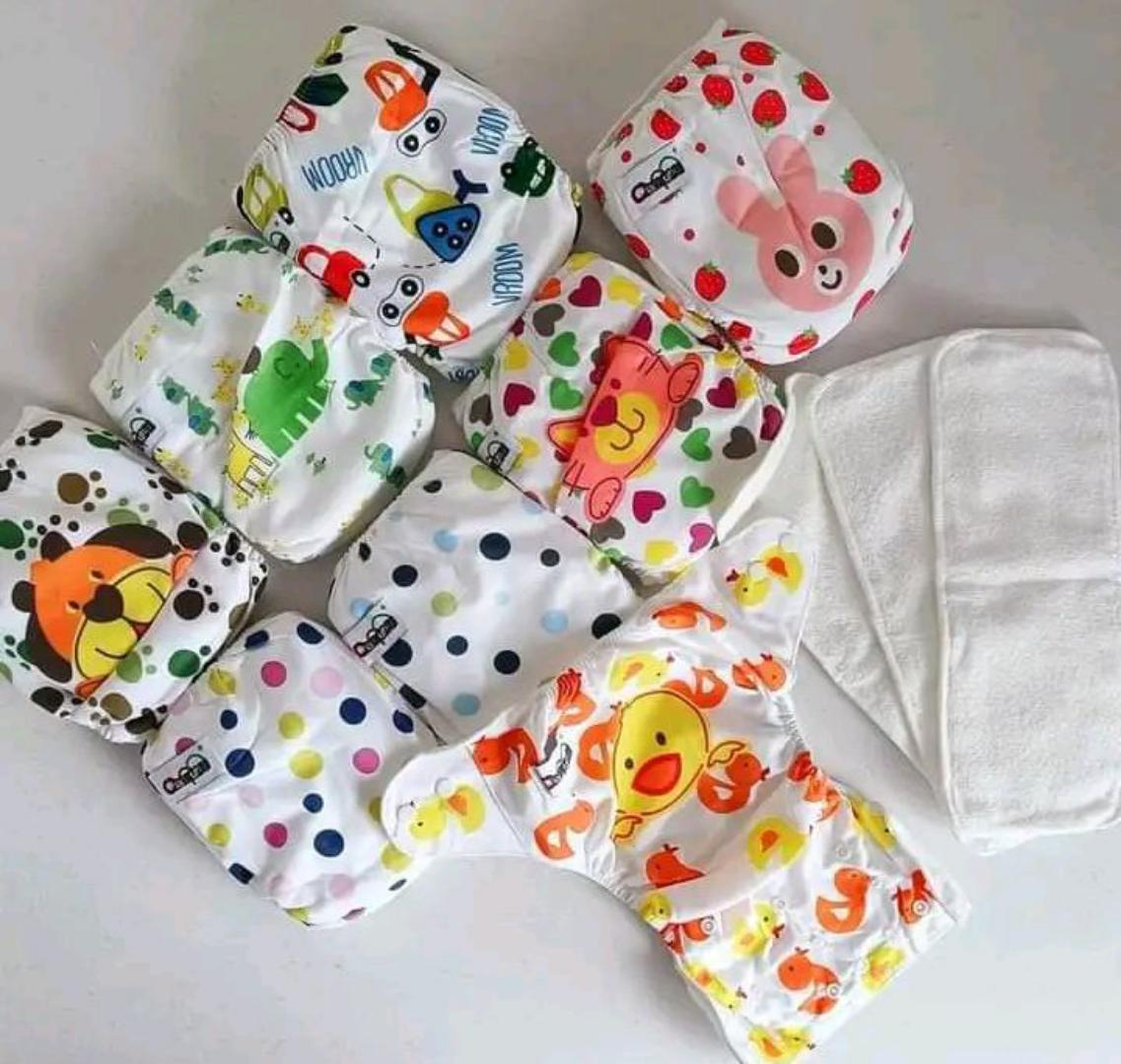 BABY ESSENTIALS::Baby nest (Foldable and portable)+baby receiving suit 8 pieces(Romper included) +1 warm woolen white dotted baby wrapper+ washable, adjustable,reusable diapers one pack ( 3 nappies)