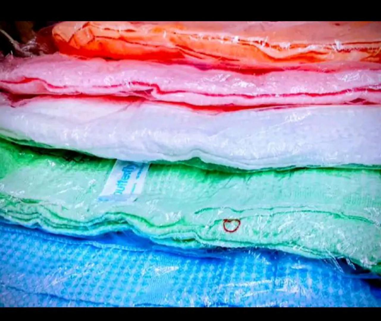 NEWBORN BABY ESSENTIALS::12 Newborn socks+1 dotted wrapper medium size +11 pieces baby suit+1 baby shawl+1 cotton lesso