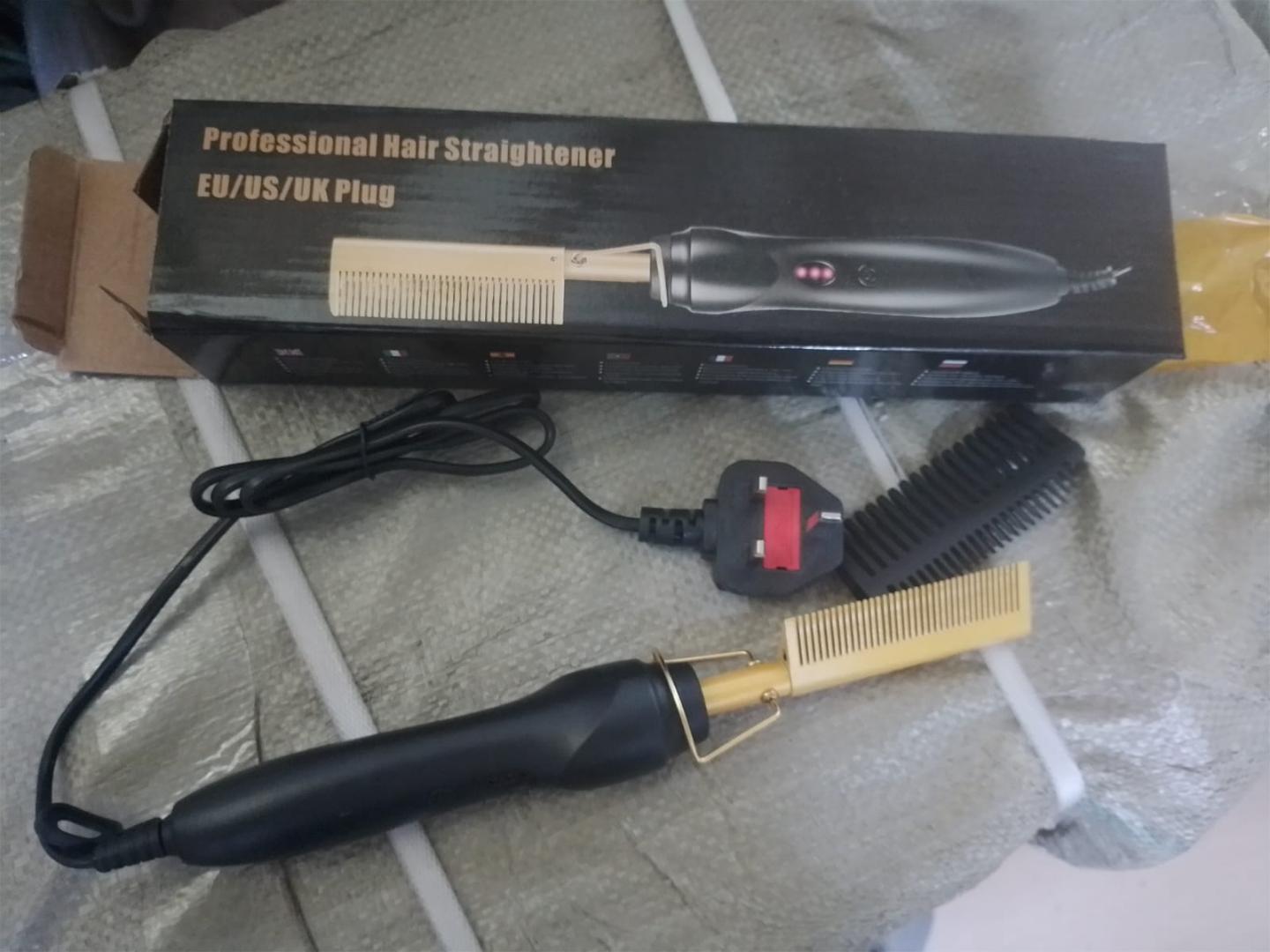 professional electric hot comb, a versatile styling tool used for straightening and smoothing hair.