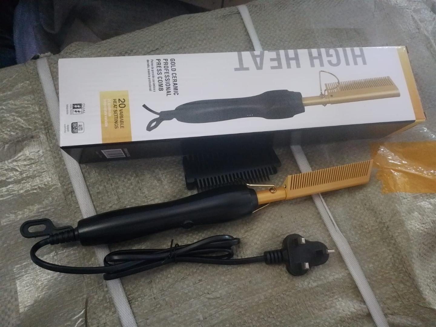 professional electric hot comb, a versatile styling tool used for straightening and smoothing hair.