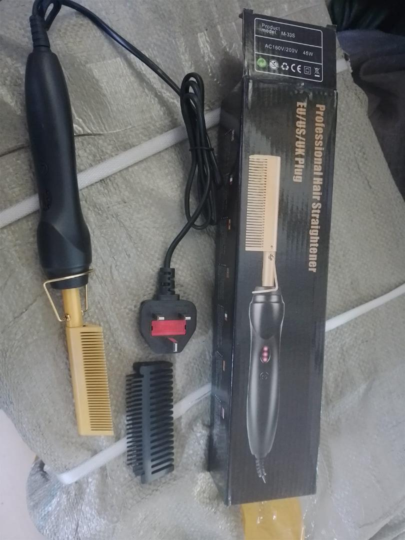 professional electric hot comb, a versatile styling tool used for straightening and smoothing hair.