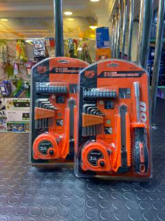 21-Piece Professional Homeowner Tool Set featuring  utility knife, a 3-meter tape measure, a hex key set, a screwdriver handle, and assorted driver bits.