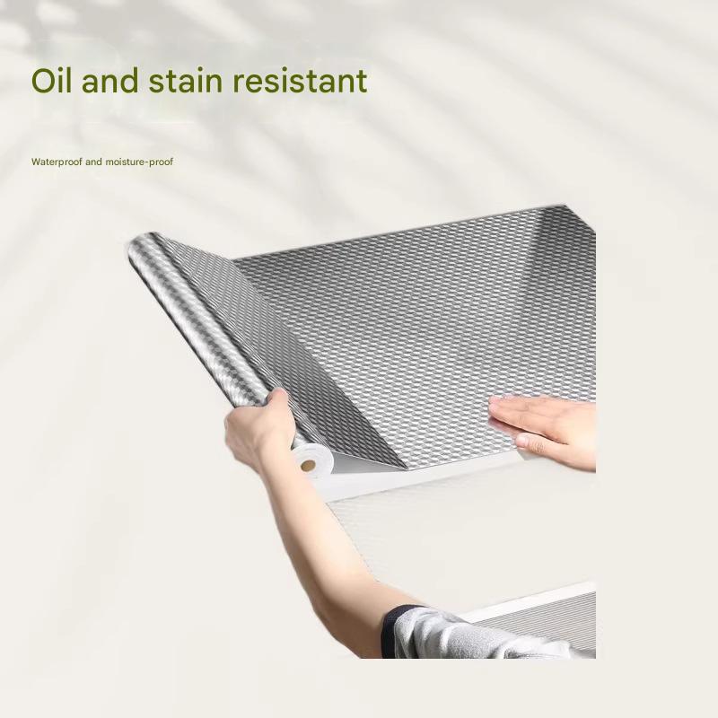 Waterproof, oil-proof, and moisture-proof stickers for cabinets, drawer liners, stovetop aluminum foil, tin foil, and self-adhesive wallpaper.
