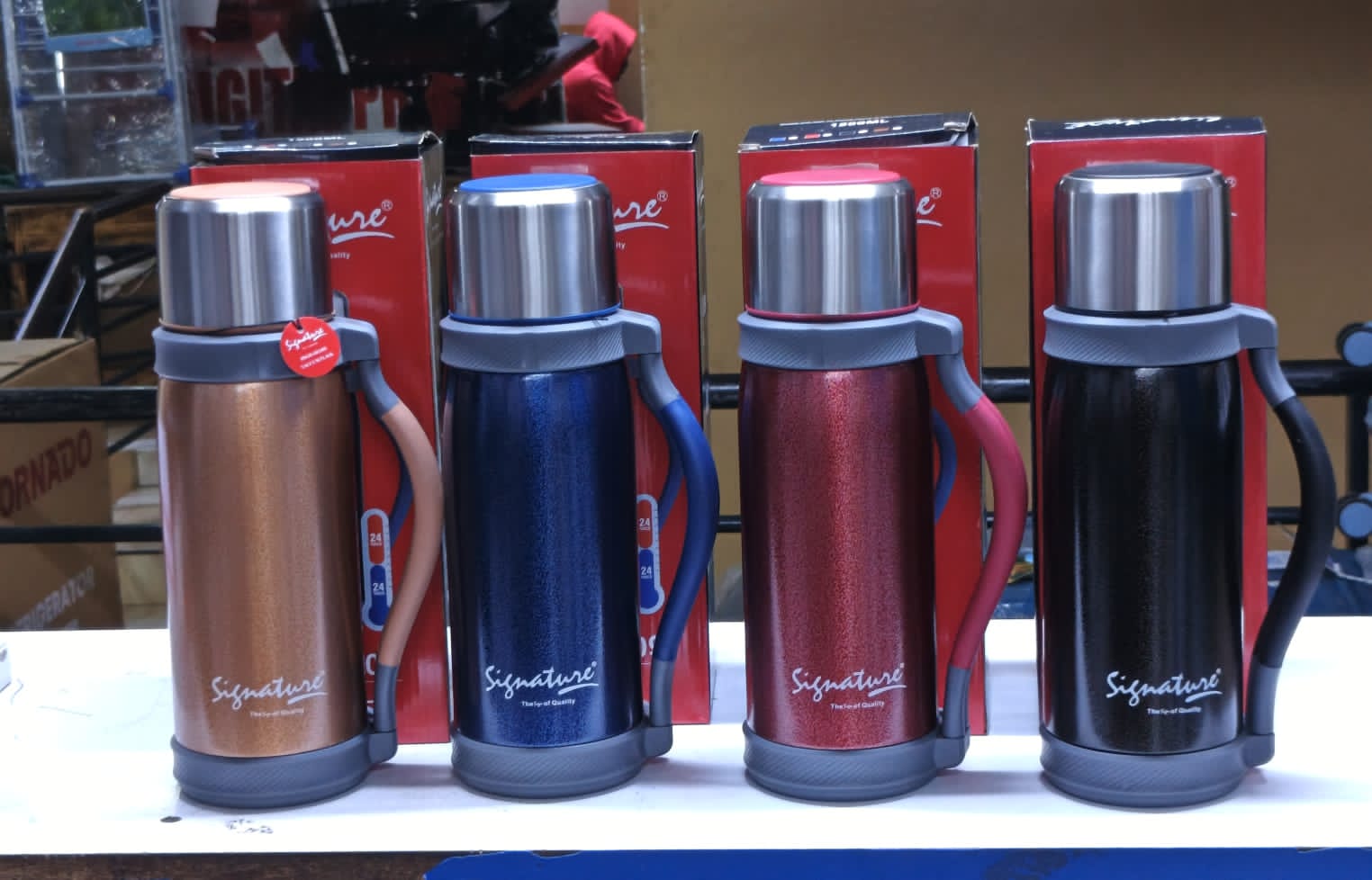 Signature 1.2L Vacuum Insulated Flask Stainless Steel Thermal Bottle Hot and Cold Beverage Container Leak Proof Travel Flask Durable Double Wall Insulation for Home Office Outdoor Use.