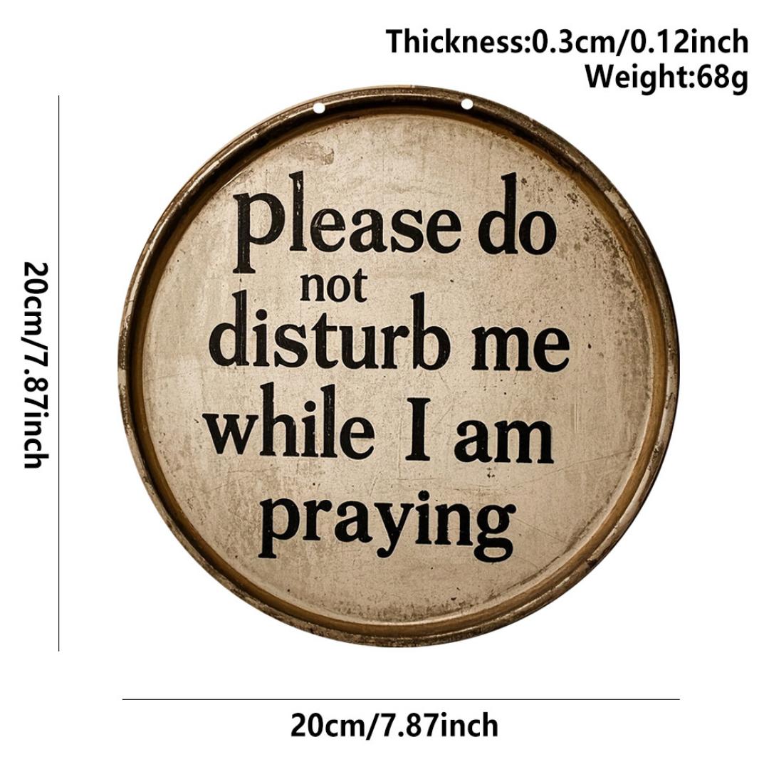 2D ROUND HOME DECOR VINTAGE HOME SIGN. This vintage round metal sign brings cheeky farmhouse charm to any space with its cream background, navy blue embossed text, and distressed rusty edges. It reads