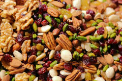 Mixed nuts are a versatile snack that typically combines variety in flavor, texture, and nutrition. Most commercial blends include a mix of peanuts, almonds, cashews, walnuts, and brazil nuts.