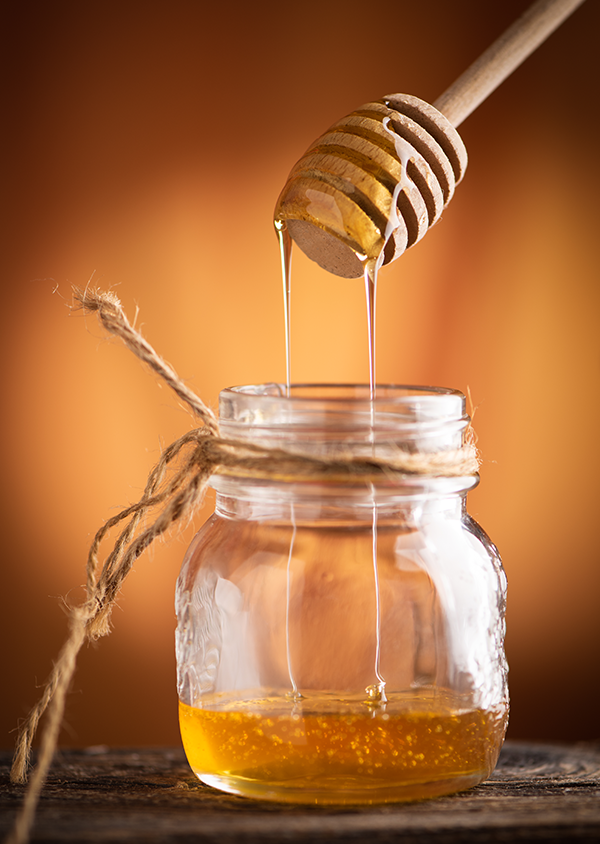 Honey is a sweet, viscous food substance made by honey bees from the nectar of flowers or plant secretions. It is primarily composed of sugars like fructose and glucose, with low water content .