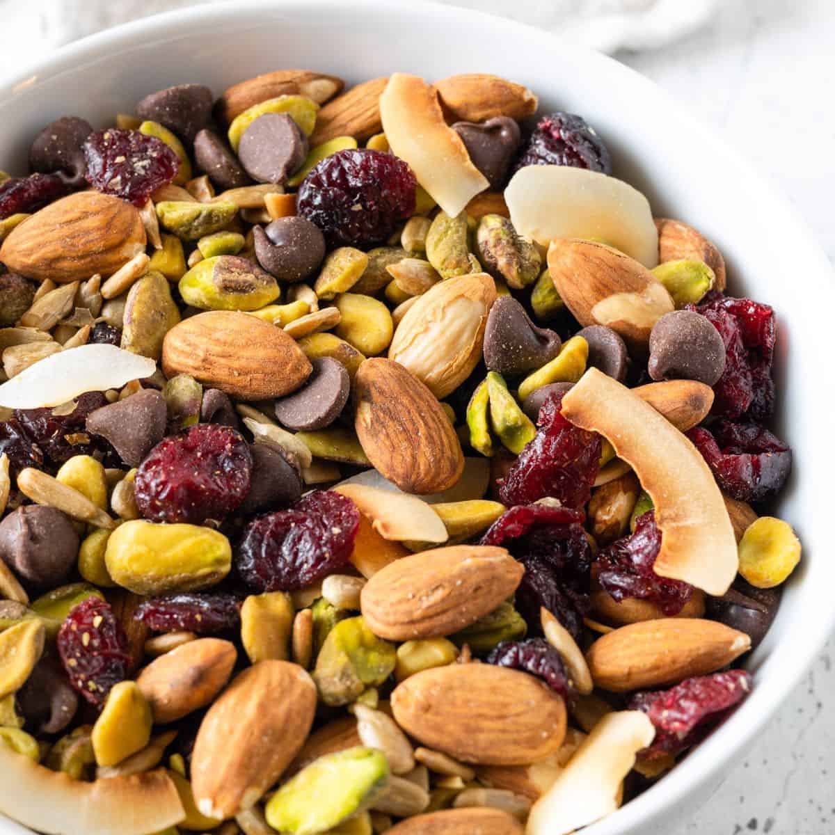 Mixed nuts are a versatile snack that typically combines variety in flavor, texture, and nutrition. Most commercial blends include a mix of peanuts, almonds, cashews, walnuts, and brazil nuts.