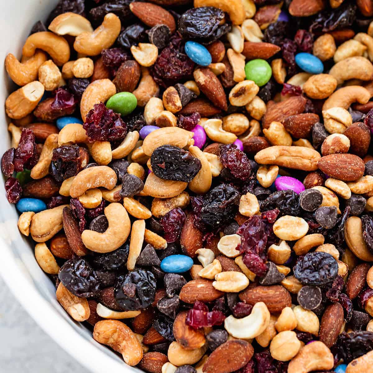 Mixed nuts are a versatile snack that typically combines variety in flavor, texture, and nutrition. Most commercial blends include a mix of peanuts, almonds, cashews, walnuts, and brazil nuts.
