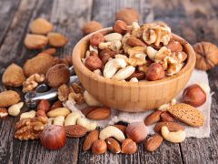 Mixed nuts are a versatile snack that typically combines variety in flavor, texture, and nutrition. Most commercial blends include a mix of peanuts, almonds, cashews, walnuts, and brazil nuts.