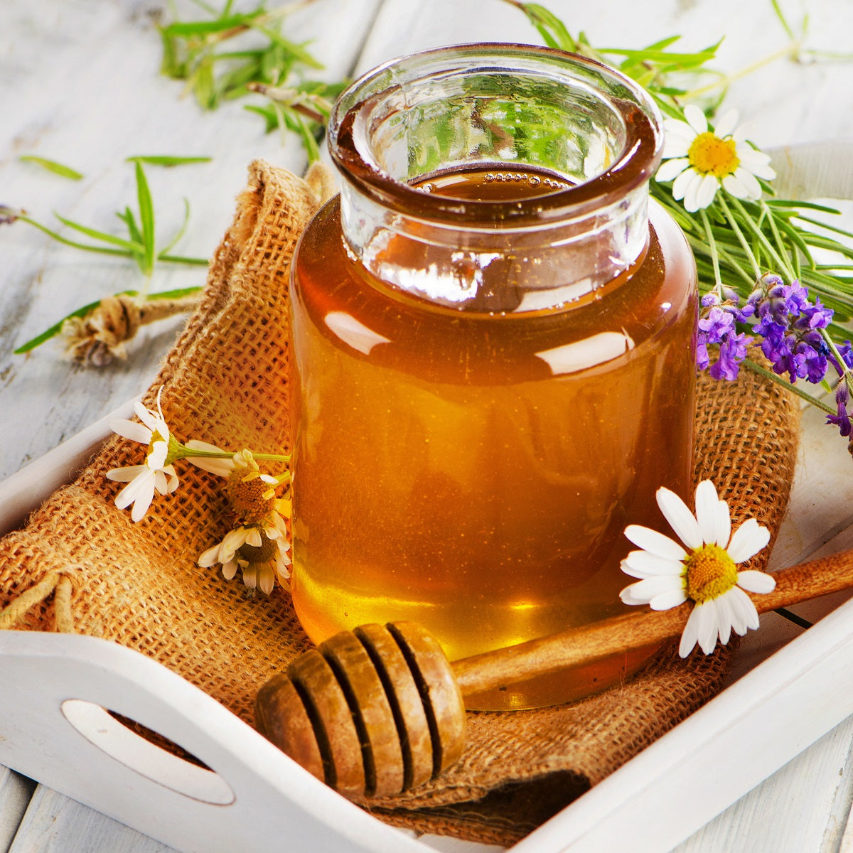 Honey is a sweet, viscous food substance made by honey bees from the nectar of flowers or plant secretions. It is primarily composed of sugars like fructose and glucose, with low water content .