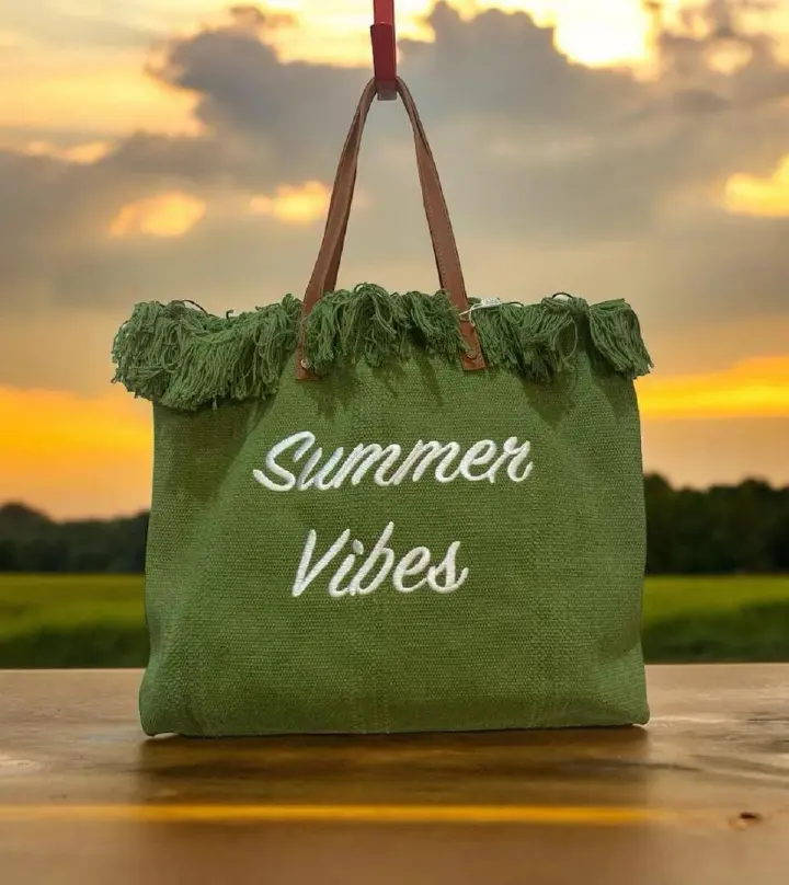 SUMMER BAGS FOR CLASSIC WOMEN✅ *Summer Vibes Tote Bag - For Sale*

Olive green canvas tote with tassel detail + leatherette handles. "Summer Vibes" embroidered print. Big enough for beach gear, grocer