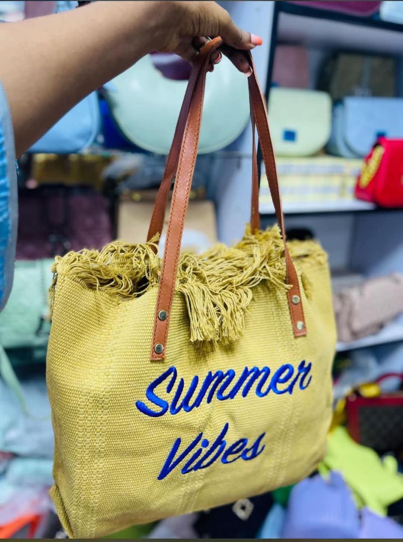 SUMMER BAGS FOR CLASSIC WOMEN✅ *Summer Vibes Tote Bag - For Sale*

Olive green canvas tote with tassel detail + leatherette handles. "Summer Vibes" embroidered print. Big enough for beach gear, grocer