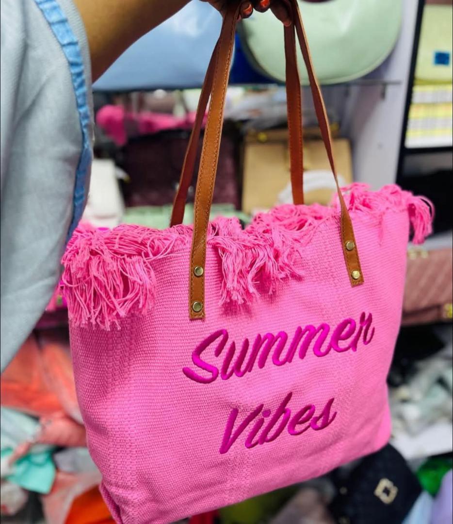 SUMMER BAGS FOR CLASSIC WOMEN✅ *Summer Vibes Tote Bag - For Sale*

Olive green canvas tote with tassel detail + leatherette handles. "Summer Vibes" embroidered print. Big enough for beach gear, grocer