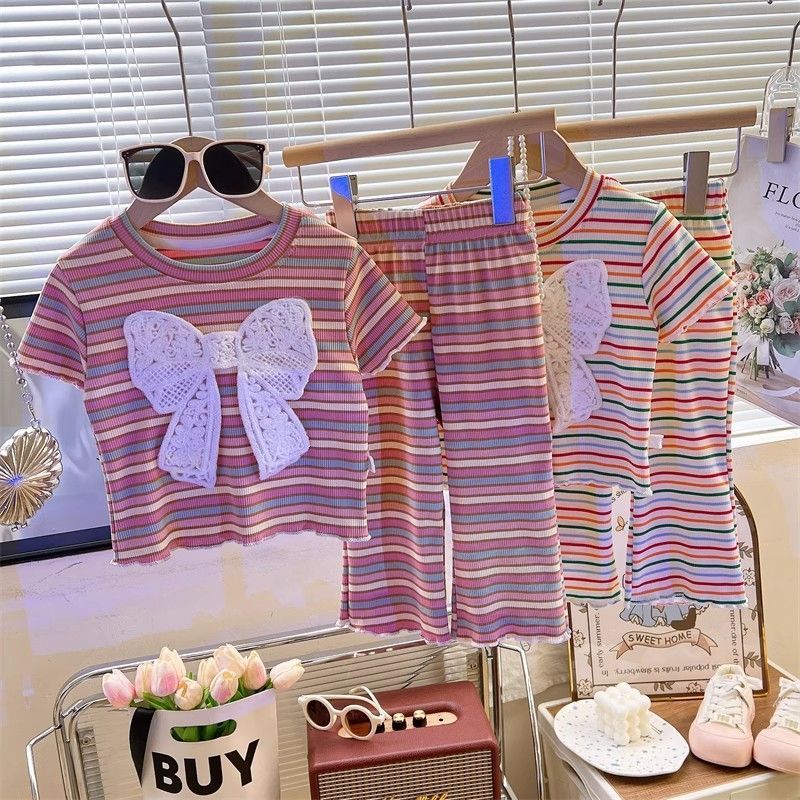 Two-piece sweet girl's children's large bow tie set: new summer style featuring a striped T-shirt and flared pants, trendy two-piece outfit.
