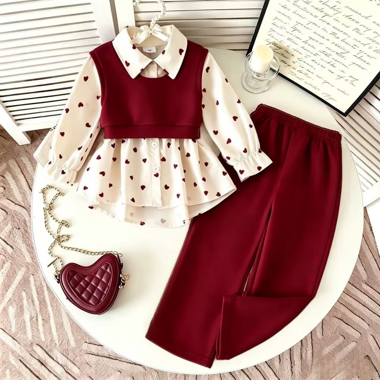 3 pieces: New autumn collection of cross-border European and American girls' sets, featuring knitted vests with heart-shaped prints, base layer shirts, and long pants.