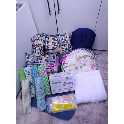 Newborn Essentials Gift Pack - 5-Piece Diaper Bag, Breast Pump, Mosquito Net, Washcloths, Baby Carrier