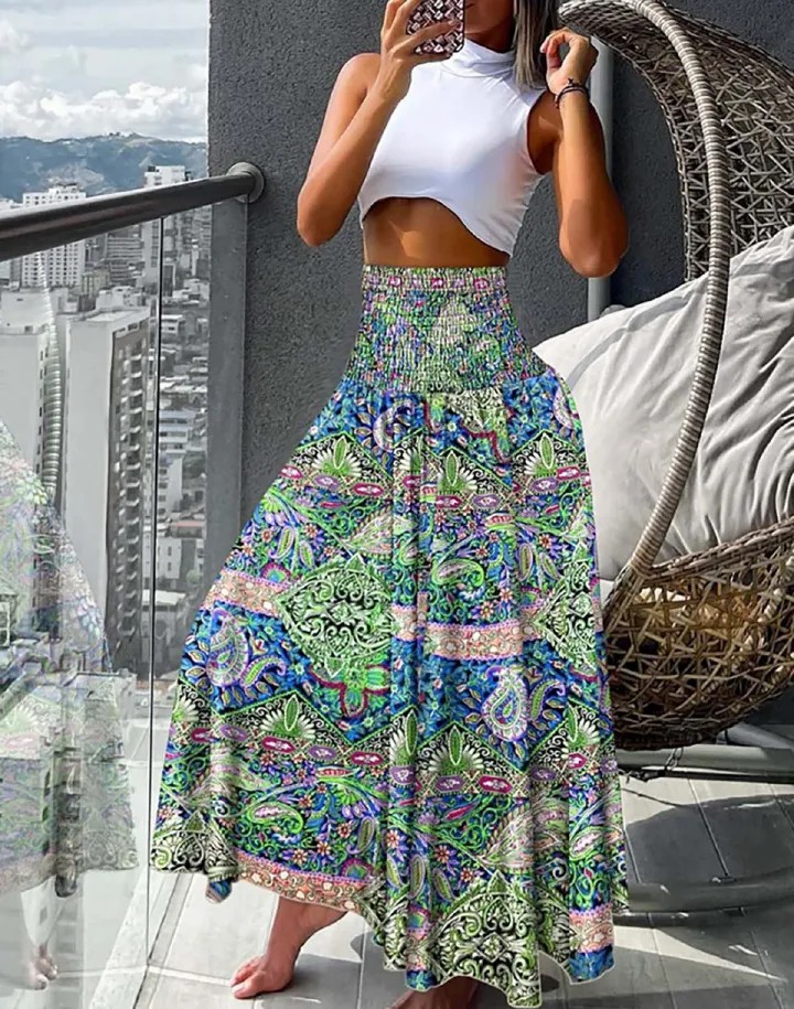New European and American women's clothing,  fashionable and versatile Bohemian printed elastic waist mid length skirt, casual loose holiday floral skirt, high waist half skirt, slim A-line skirt,