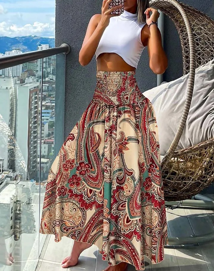 New European and American women's clothing,  fashionable and versatile Bohemian printed elastic waist mid length skirt, casual loose holiday floral skirt, high waist half skirt, slim A-line skirt,