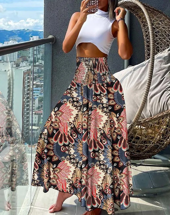 New European and American women's clothing,  fashionable and versatile Bohemian printed elastic waist mid length skirt, casual loose holiday floral skirt, high waist half skirt, slim A-line skirt,