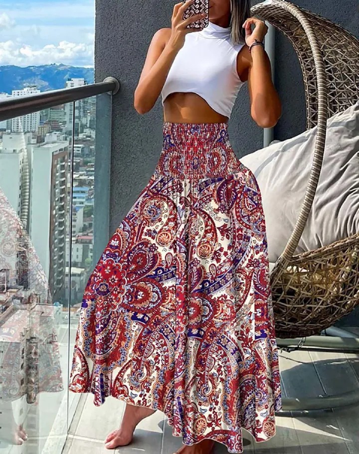 New European and American women's clothing,  fashionable and versatile Bohemian printed elastic waist mid length skirt, casual loose holiday floral skirt, high waist half skirt, slim A-line skirt,