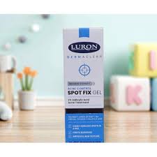 Luron Derma Clear Acne Control Spot Fix Gel, a 15 mL (0.51 fl. oz.) topical product labeled with 2% salicylic acid and key ingredients like tea tree oil, lemon extract, and iris root.