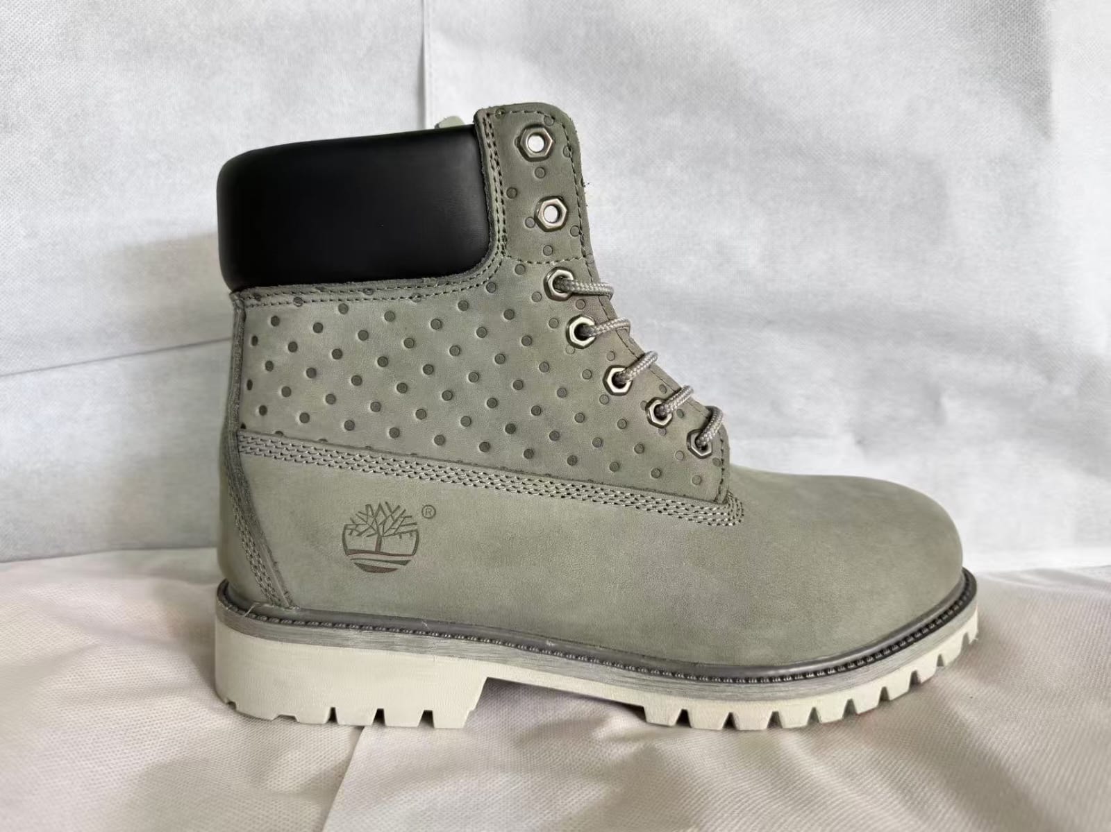 Discover the Timberland -patterned boots, crafted with premium materials and rugged construction for unmatched durability. Enjoy cushioned support and a striking design that elevates any outfit,