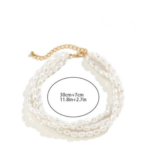 Minimalist French-style faux pearl choker necklace with a sweet yet edgy, niche heart-shaped pendant