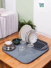kitchen sink drainage mat.Keep your sink area clean, dry, and spotless with this Kitchen Sink Drainage Mat. Designed to aid in draining excess water after washing dishes, fruits, or vegetables.