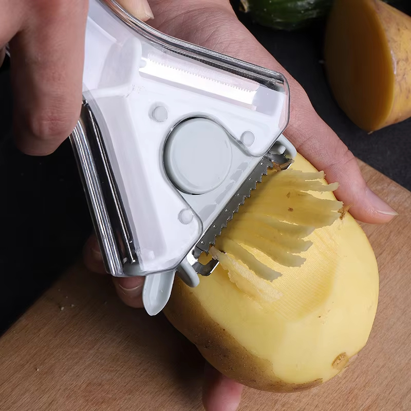 Kitchen rotating fruit and vegetable peeler, chopper, slicer, peeler, shaver, debarker