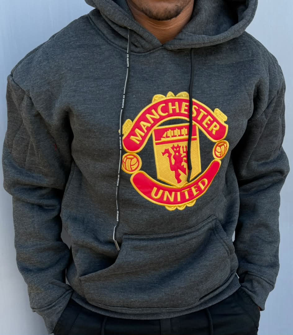 Warm  Manchester United  pullover hoodie with adjustable drawstring hood and a front kangaroo pouch pocket.