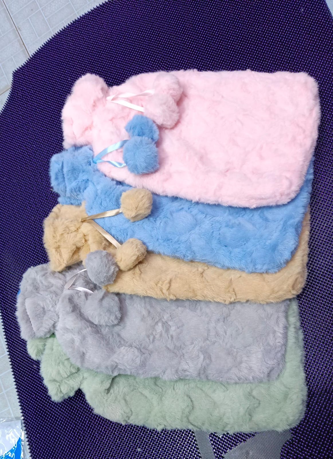2L hot water bottle with soft fluffy cover. Provides long-lasting warmth & pain relief for back, cramps, cold nights, and relaxation.