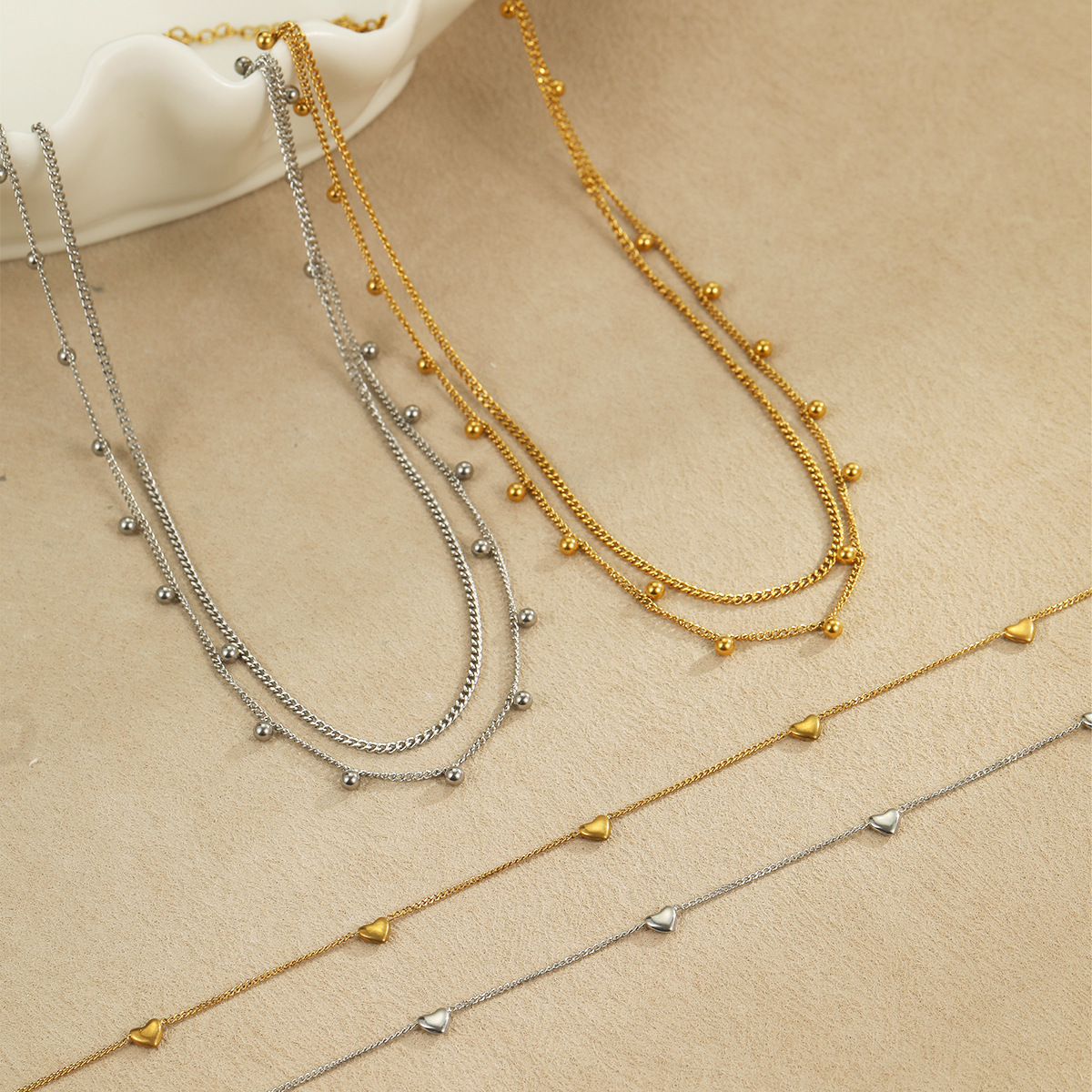 Cross border hot selling multi-layer gold round bead stainless steel necklace in Europe and America, retro fashion layered gold necklace wholesale for women