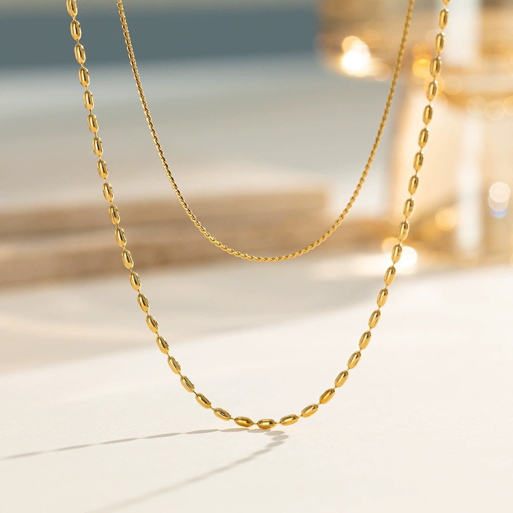 European and American fashion ins simple niche design rice grain chain personality stainless steel plated 18K gold multi-layer necklace women's wholesale
