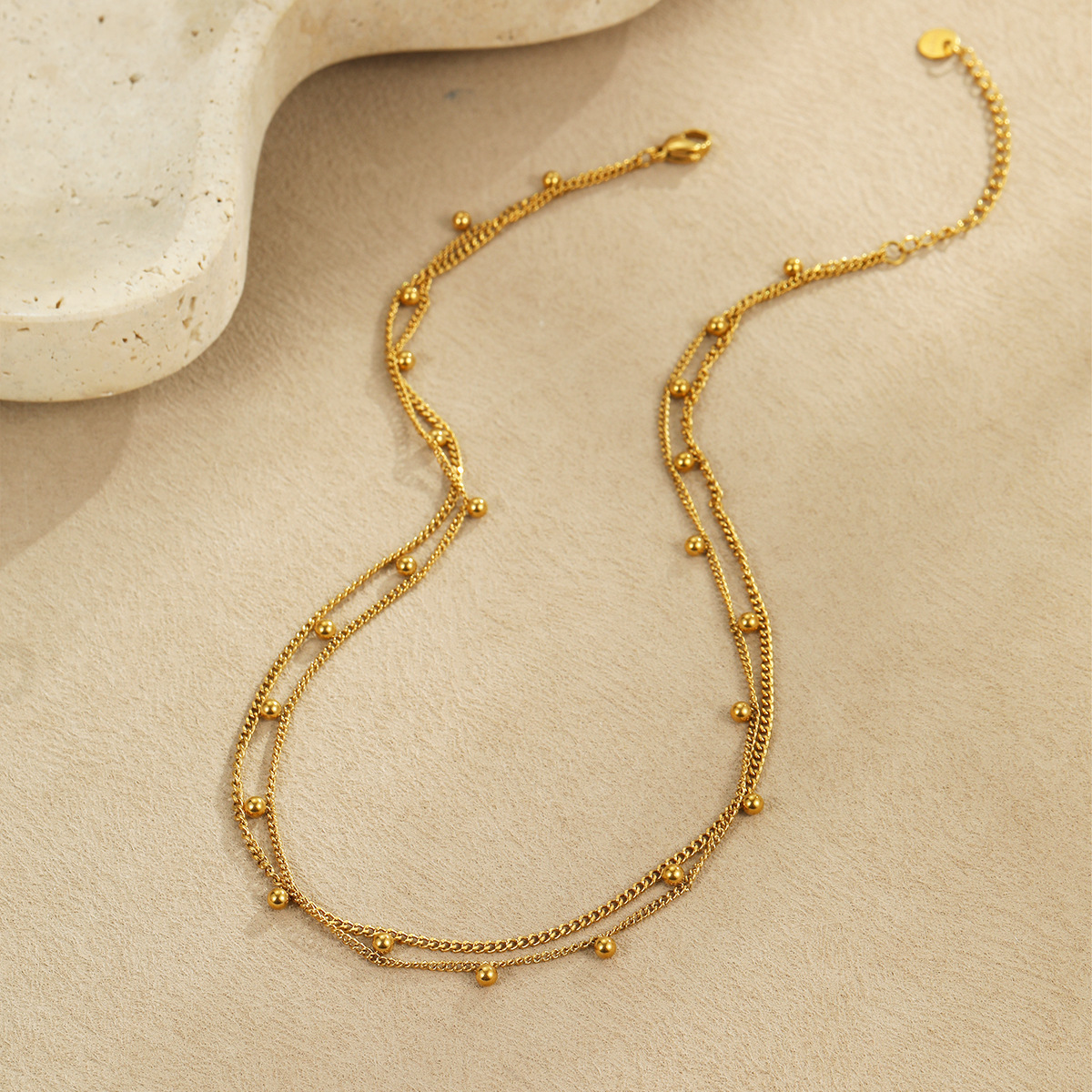 Cross border hot selling multi-layer gold round bead stainless steel necklace in Europe and America, retro fashion layered gold necklace wholesale for women